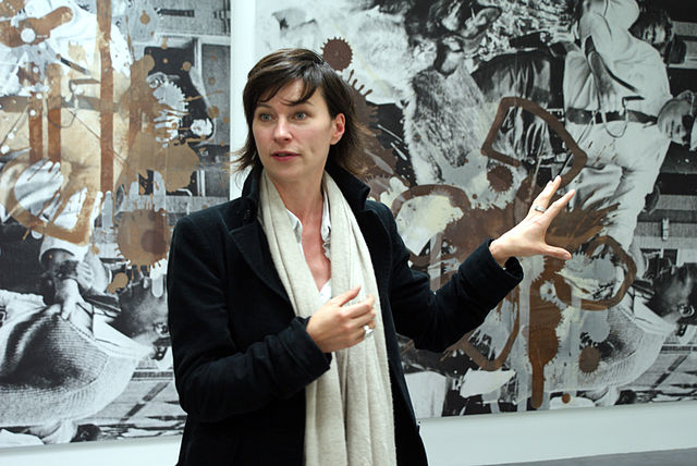 Curator Anne Pontégnie at Kelley Walker's exhibition (Wiels contemporary art center, Brussels, B). CC BY-SA 3.0 image fr Wikimedia Commons by Marcwathieu